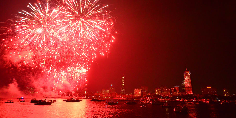 A July 4th fireworks display over the Charles River in Boston