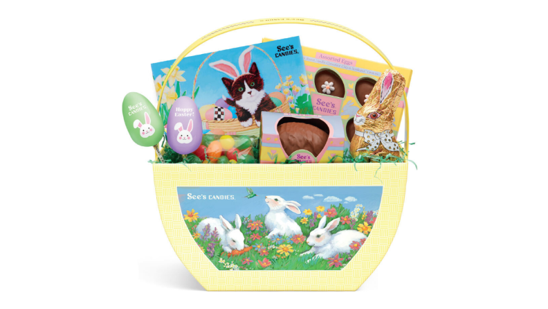 A yellow Easter basket full of See's candy chocolate treats.