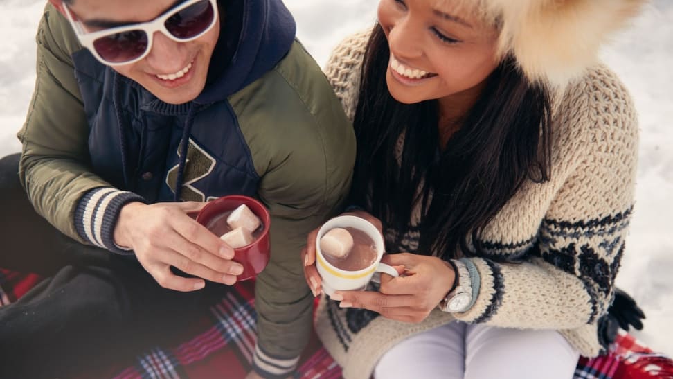 Hot cocoa will keep you warm at this outdoor gathering.