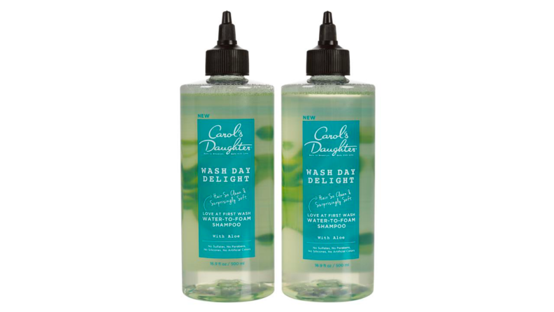 An image of two haircare products from Carol's Daughter (Wash Day haircare shampoo and conditioner).