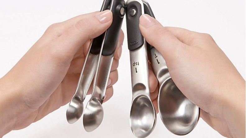 These measuring spoons stack using magnets for easy storage.