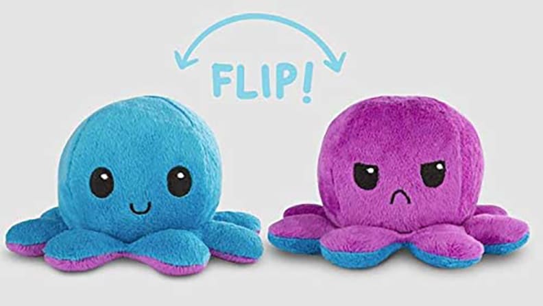 Happy blue and angry purple octopus plushies.