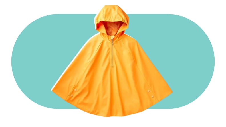 A yellow adaptive rain poncho on a colorful background