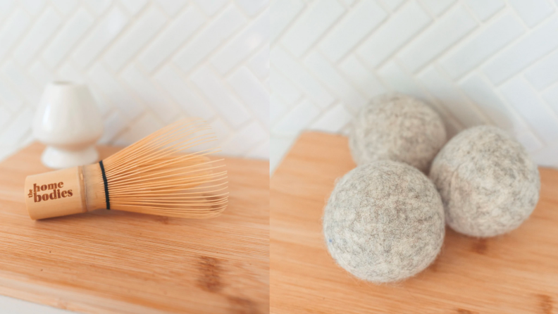 1) A wooden scrubber 2) Three organic dryer balls