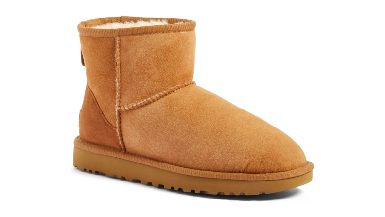 A pair of short ankle-length UGG boots in caramel suede.