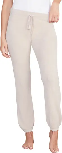 A model wearing a pair of CozyChic Ultra Lite Lounge Track Pants.
