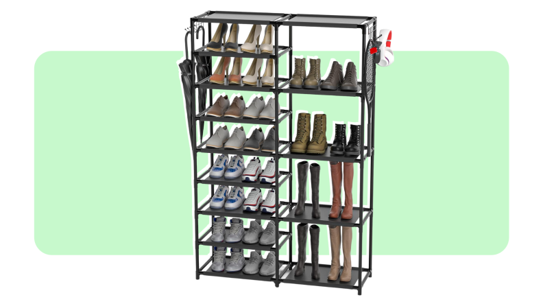Black, stackable shoe storage rack filled with assorted shoes in front of light green background.