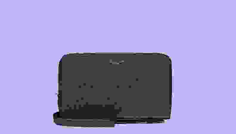 Black wallet against purple background