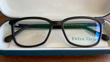 Close up of Felix Gray blue light glasses in a case.