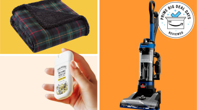 Collage of household essentials — a plaid throw blanket, a hand holding Poo-Pourri toilet spray, and a BISSELL upright vacuum with a “Prime Day Reviewed” badge on bright color-blocked backgrounds.