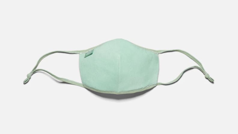 A light green face mask.