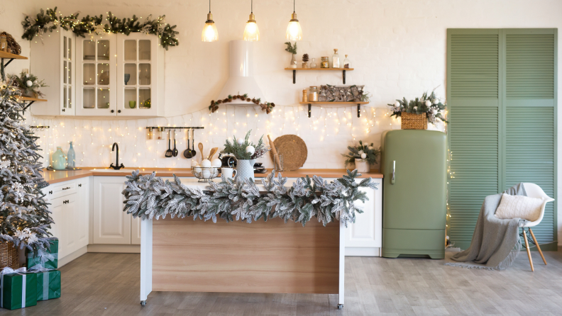 Modern style kitchen decorated for Christmas.