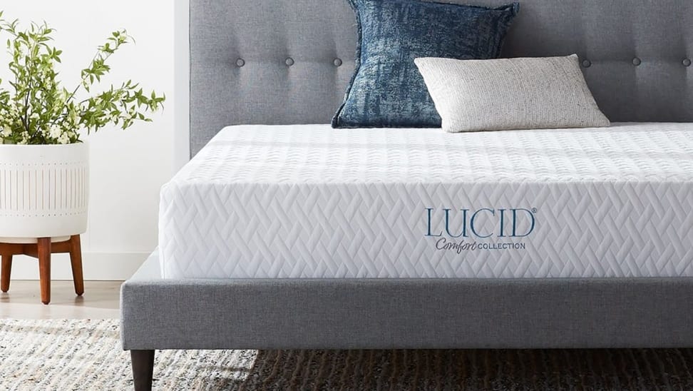 Memory foam mattress with pillows in bed frame in bedroom overstock.