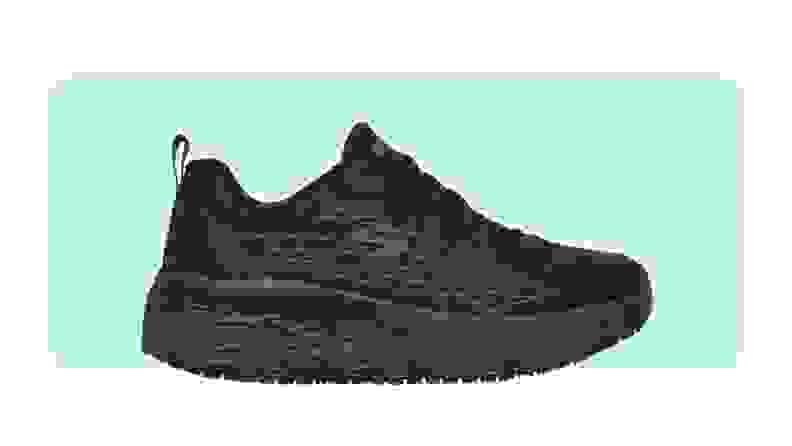 Black Max Cushioning Elite SR shoes on a colorful background