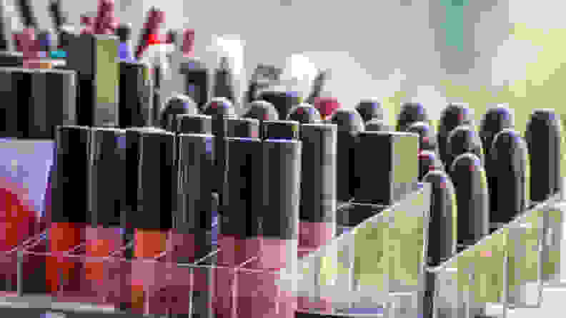 A photo of lipsticks in an organizational container.