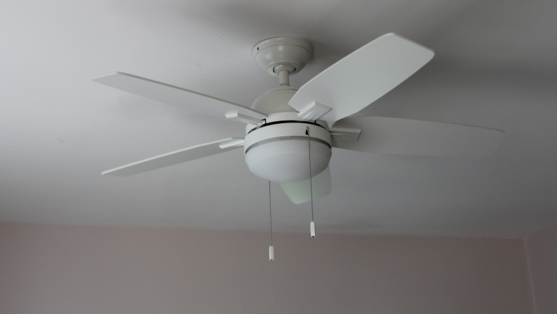 A white ceiling fan inside a home