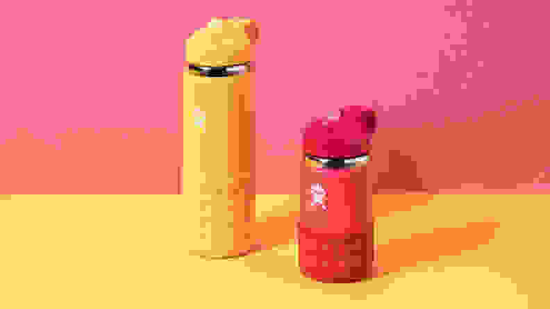 A gold and a red HydroFlask