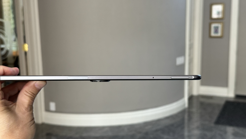 A person holding the OnePlus Pad 2.