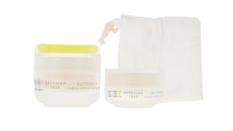 An image of a set of skincare including a cloth bag and two containers of makeup removing cleanser