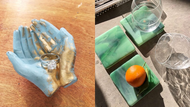 Left: handmade ceramic cupped hand design, Right: Green glass marbled coasters next to glass and a fruit