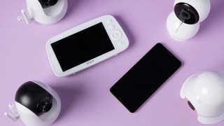 A plethora of baby monitors on a purple background