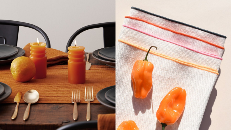 On left, two orange candles lit on a table. On right, stack of colorful napkins with fresh peppers on top.