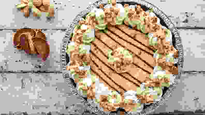Peanut butter cream pie on a wooden background