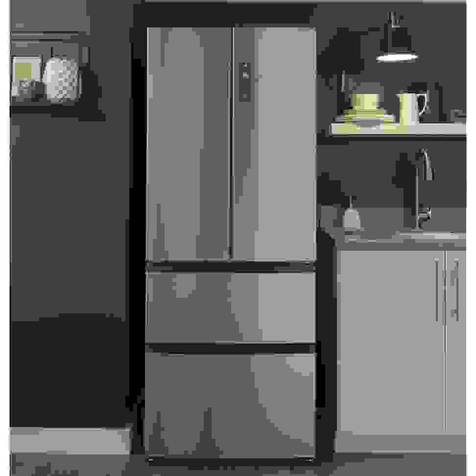 A close-up of a French-door refrigerator installed in a modern kitchen.
