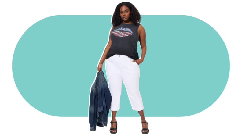 A model wearing the Torrid Crop Boyfriend Straight Vintage jean in white.