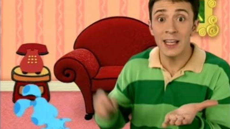 A still from Blue's Clues featuring Steve and Blue.