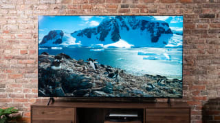The LG QNED99 8K TV displaying 4K/HDR content in a living room setting