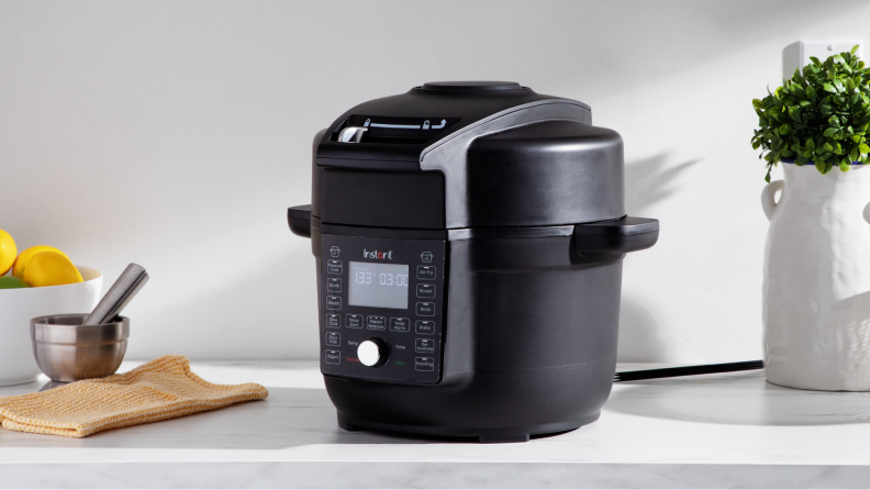 The Instant Pot on display in a kitchen setting.