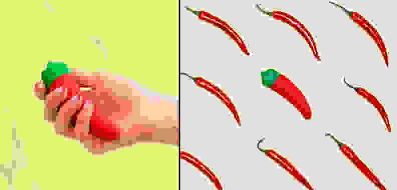 A photo collage of a hand holding the Emojibator Chili Pepper and a eight real chili peppers surrounding the Emojibator Chili Pepper.