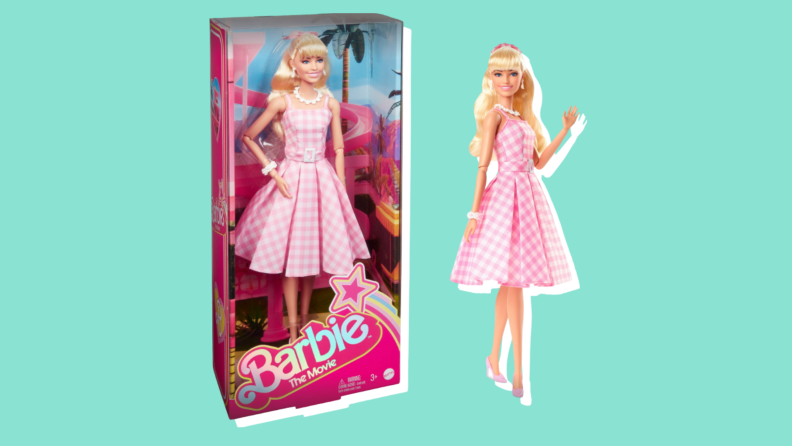 A Barbie doll in a package and another posed.