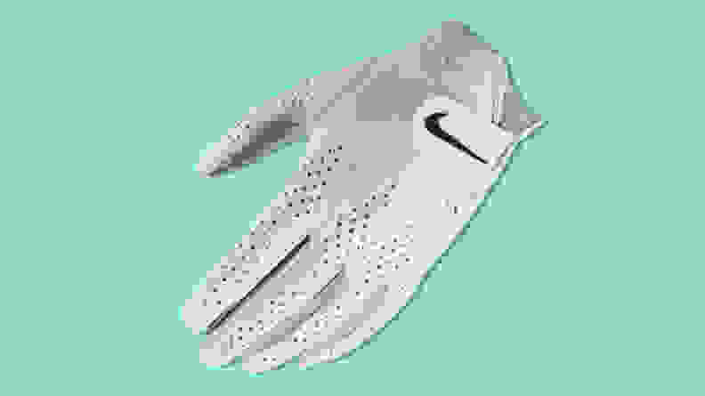 Nike Men’s 2021 Tour classic golf glove on a teal background.