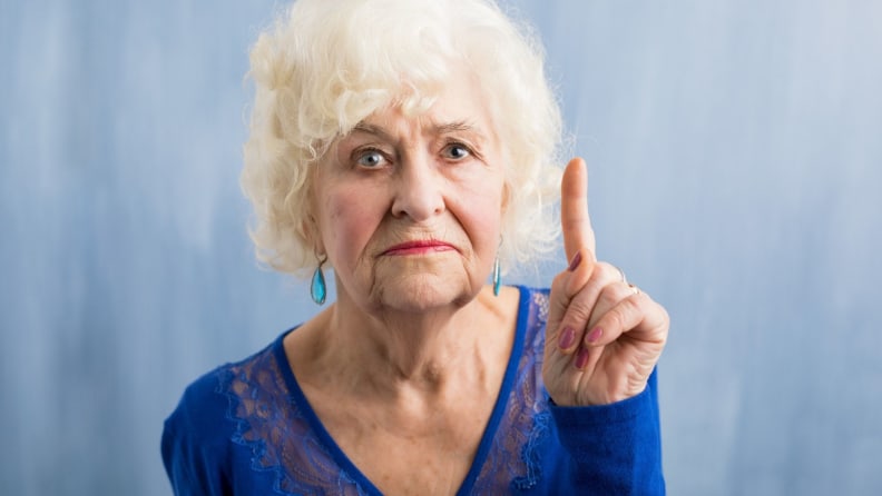 A stern grandmother wagging her finger