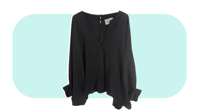 Product shot of a black blouse.