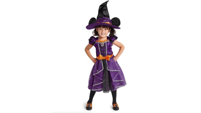 A girl in a Minnie witch costume.