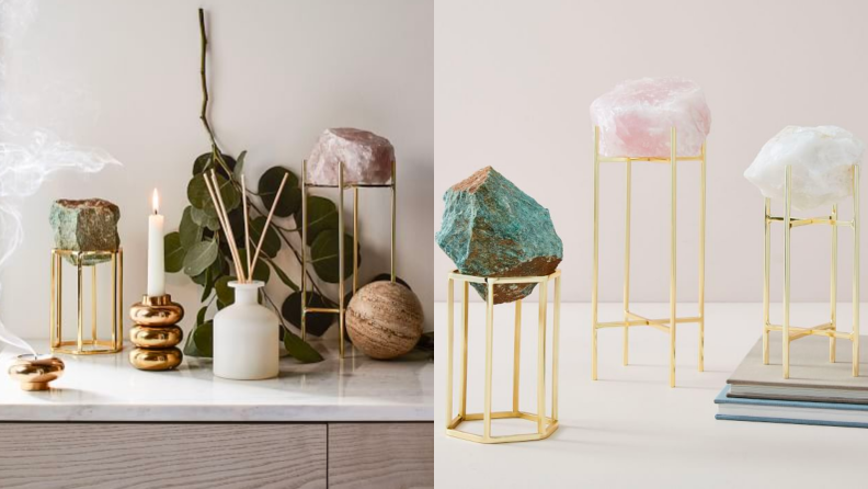 Crystals and geodes displayed on gold stands.