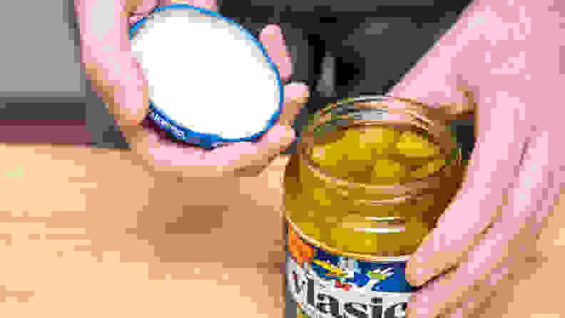 An open jar of pickles