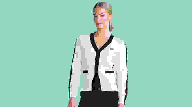 woman wearing white and black cardigan