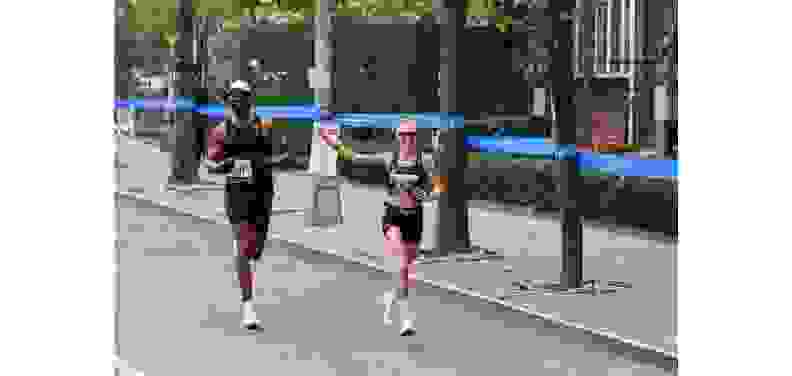Matt James running a race wearing the Nike Vaporfly sneakers
