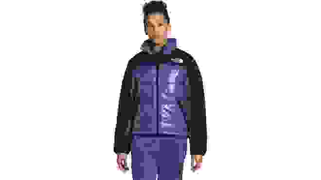 Person wearing purple and black puffer jacket.
