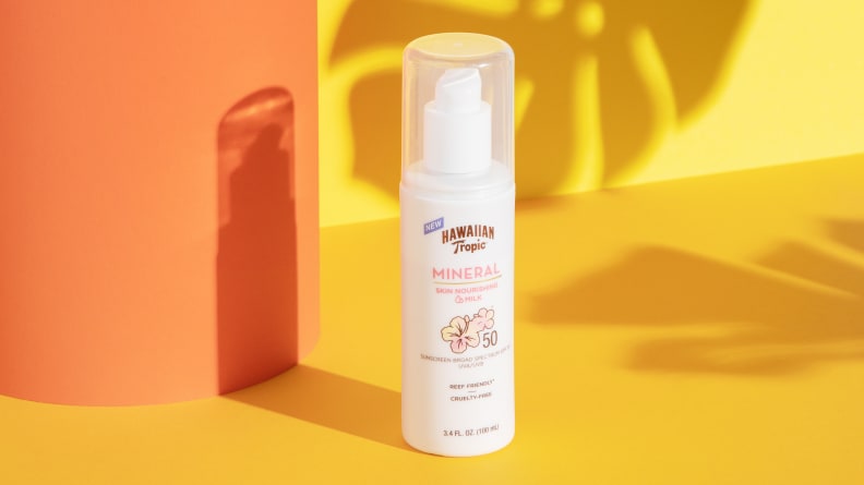 Hawaiian Tropic Nourishing Skin Milk sunscreen against a yellow background.