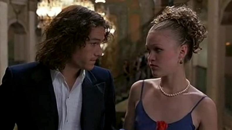 A still from '10 Things I Hate About You' featuring Heath Ledger looking at Julia Stiles.