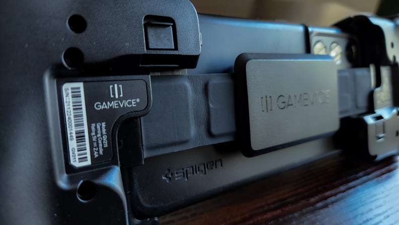 The back ribbon of the Gamevice Flex sitting on a table.
