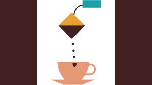 A tea bag drips into a cup