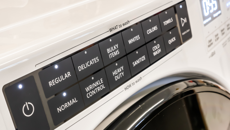 A control panel of a Whirlpool front-loading washing machine.