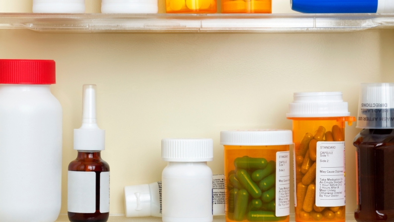 Assorted medications in medicine cabinet.