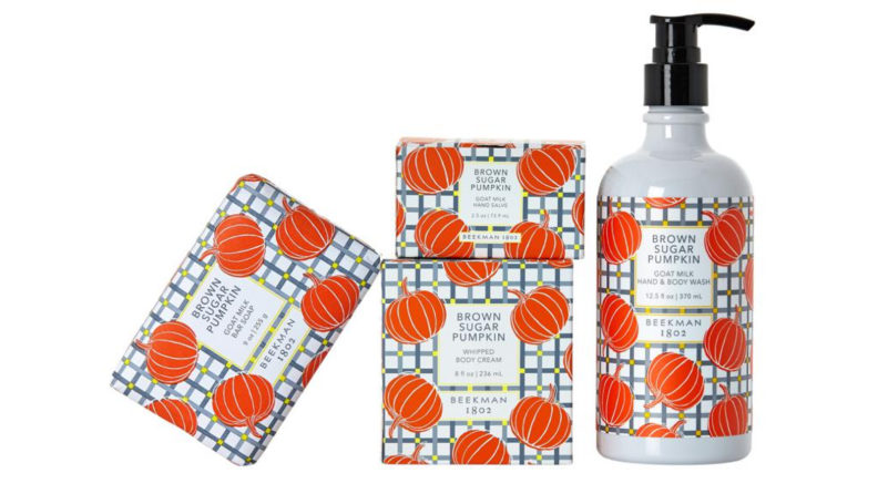 An image of a set of four products from Beekman 1802 including a soap bar and hand soap, all in the Brown Sugar Pumpkin scent.